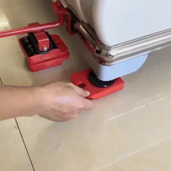 Image of a user placing the wheels underneath a piece of furniture, using the crowbar to lift it