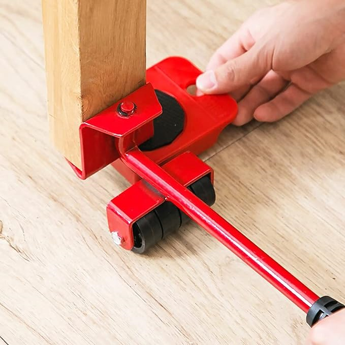 Image of a user placing the wheels underneath a piece of furniture, using the crowbar to lift it